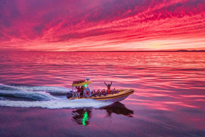 a small boat in a body of water