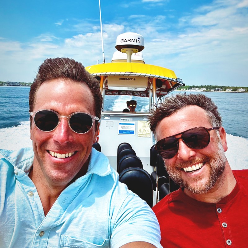 Buster B. Jones wearing sunglasses taking a selfie